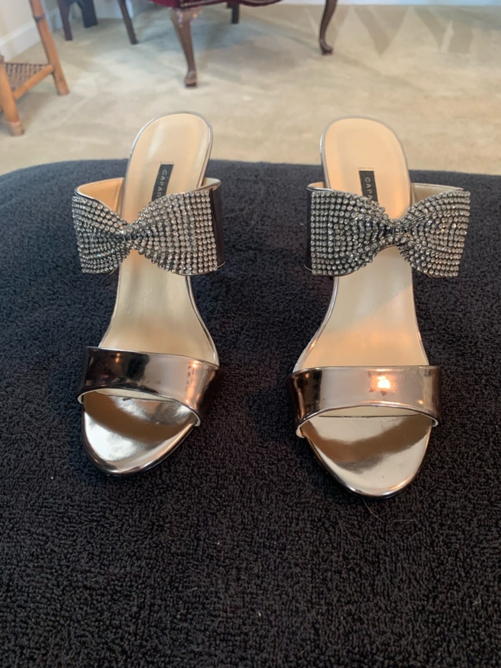 Caparros Silver Bow-Embellished Mule Sandals
